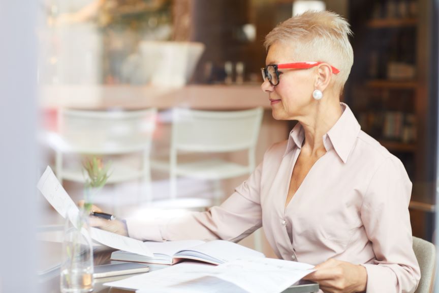 woman-doing-paperwork-2021-08-27-22-41-52-utc 864x576